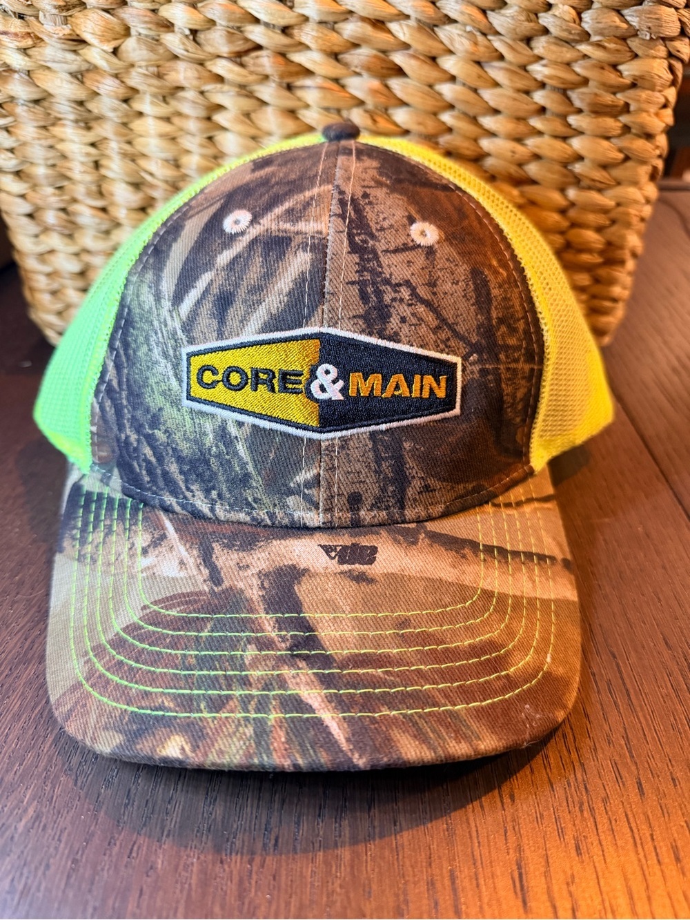 Men's CORE & MAIN Camo Trucker Cap with Neon Yellow Mesh